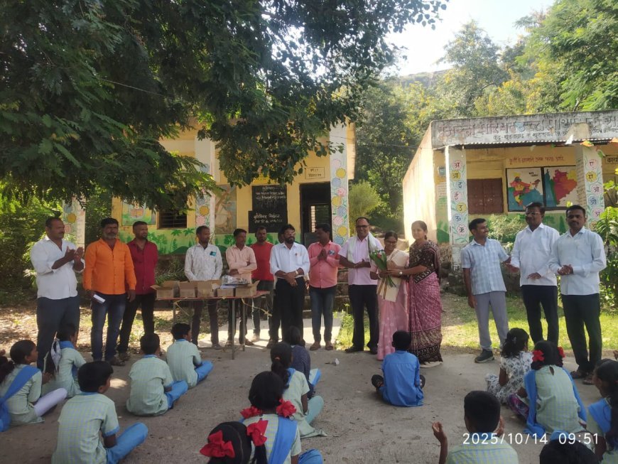 Distribution of educational material to the students by the transferred teacher in Lamangaon Zilla Parishad School. The eyes of the students became moist during the farewell ceremony.